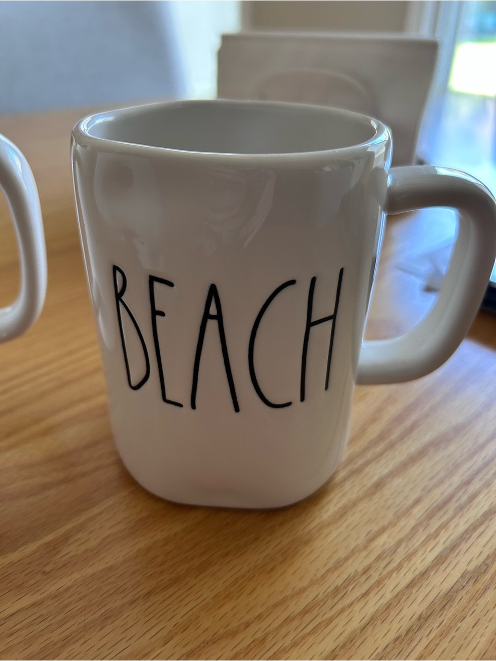 Rae Dunn White Ceramic Mug with 'BEACH' Black Lettering